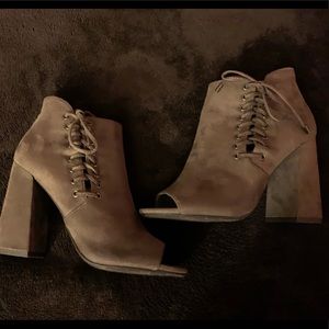 Ankle boot with a heel and open toe